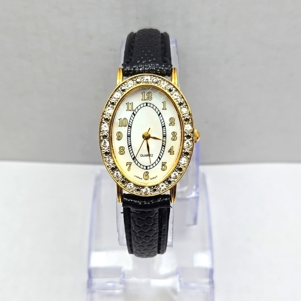 Womens AVON F66681-7/P Gold Tone Quartz Analog Watch Bezel MOP Face New Battery